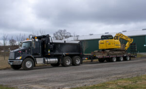 Town & Country Commercial Property Maintenance Truck hauling Equipment